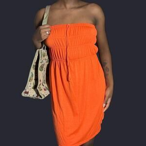 Bright tangerine orange strapless dress